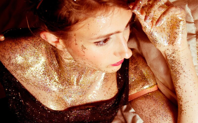 woman covered in glitter