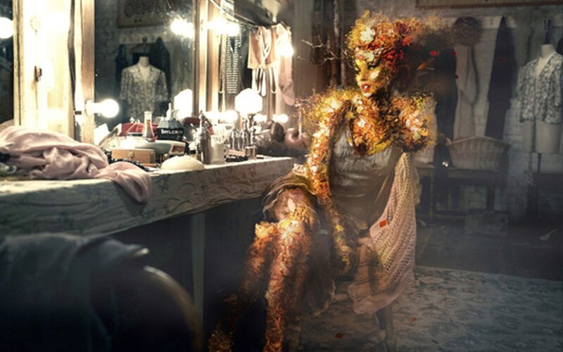 Woman Covered in Leaves