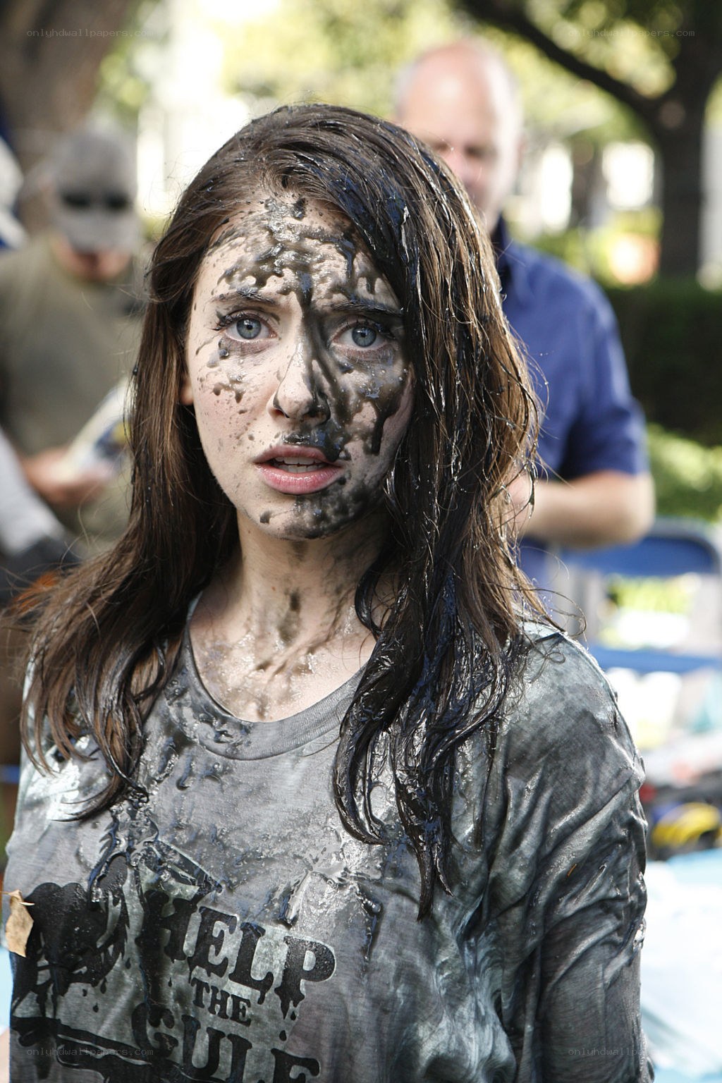 woman covered in mud