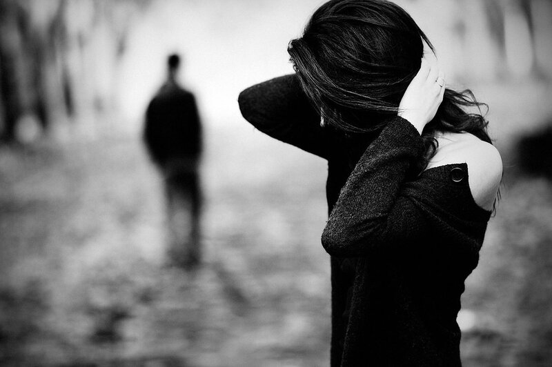 Woman Covering Face — Black, Dramatic