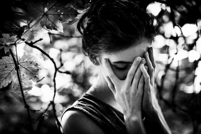 Woman Covering Face — Black, Somber