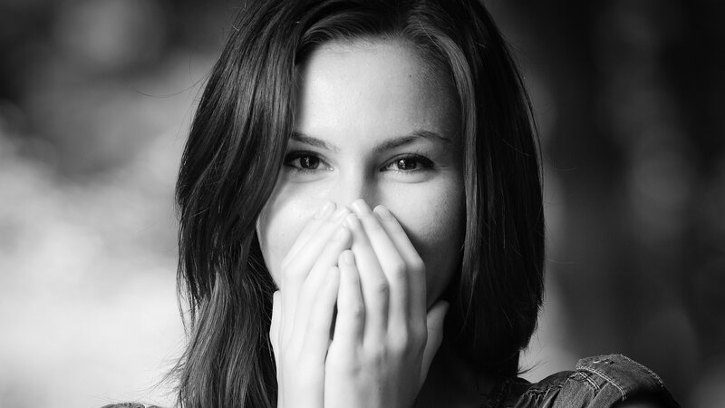 Woman Covering Mouth — Black