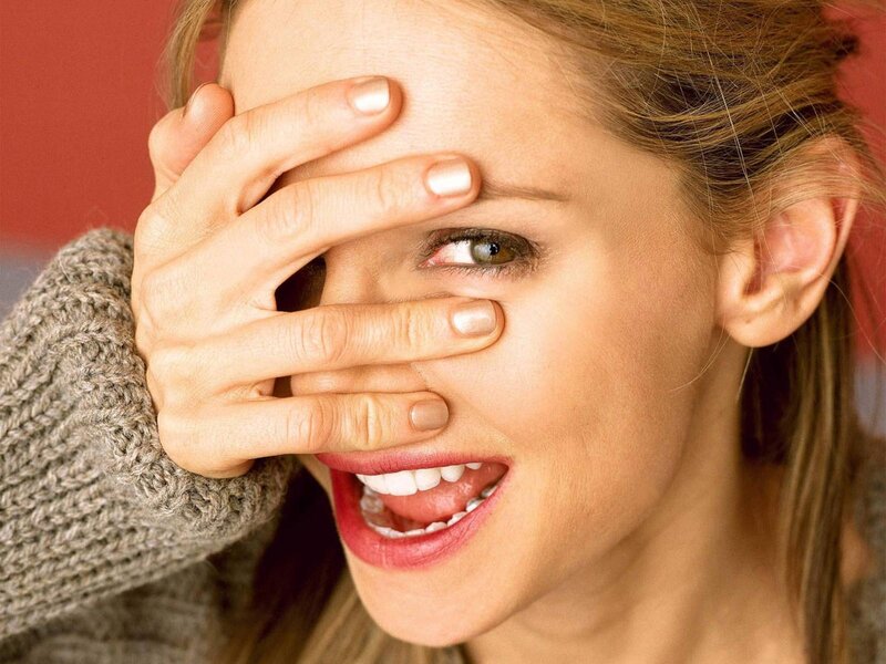 Woman Covering One Eye — Brown
