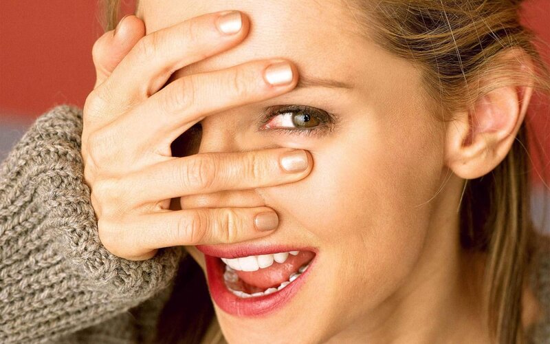 Woman Covering One Eye — Red, Playful
