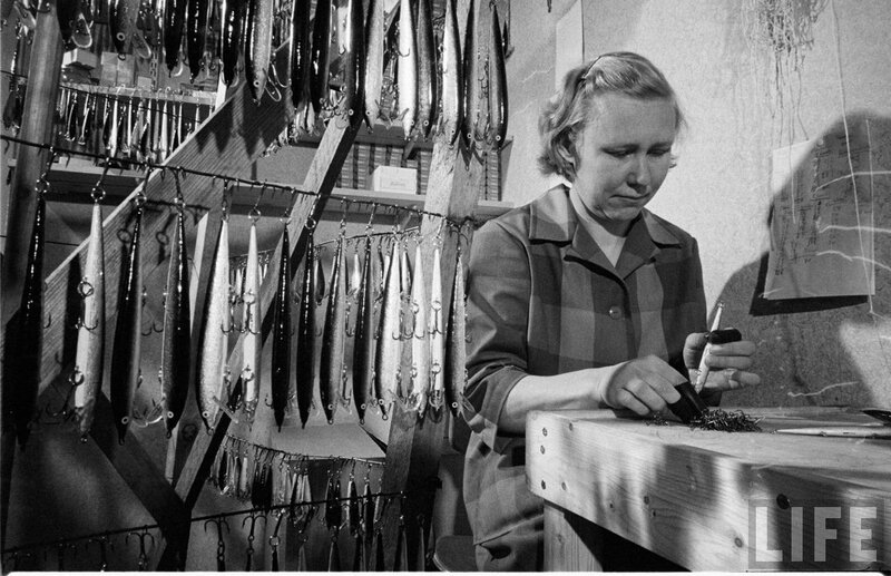 Woman crafting fishing lures