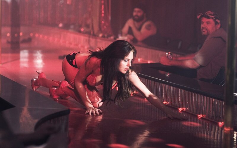 woman crawling on floor in red light
