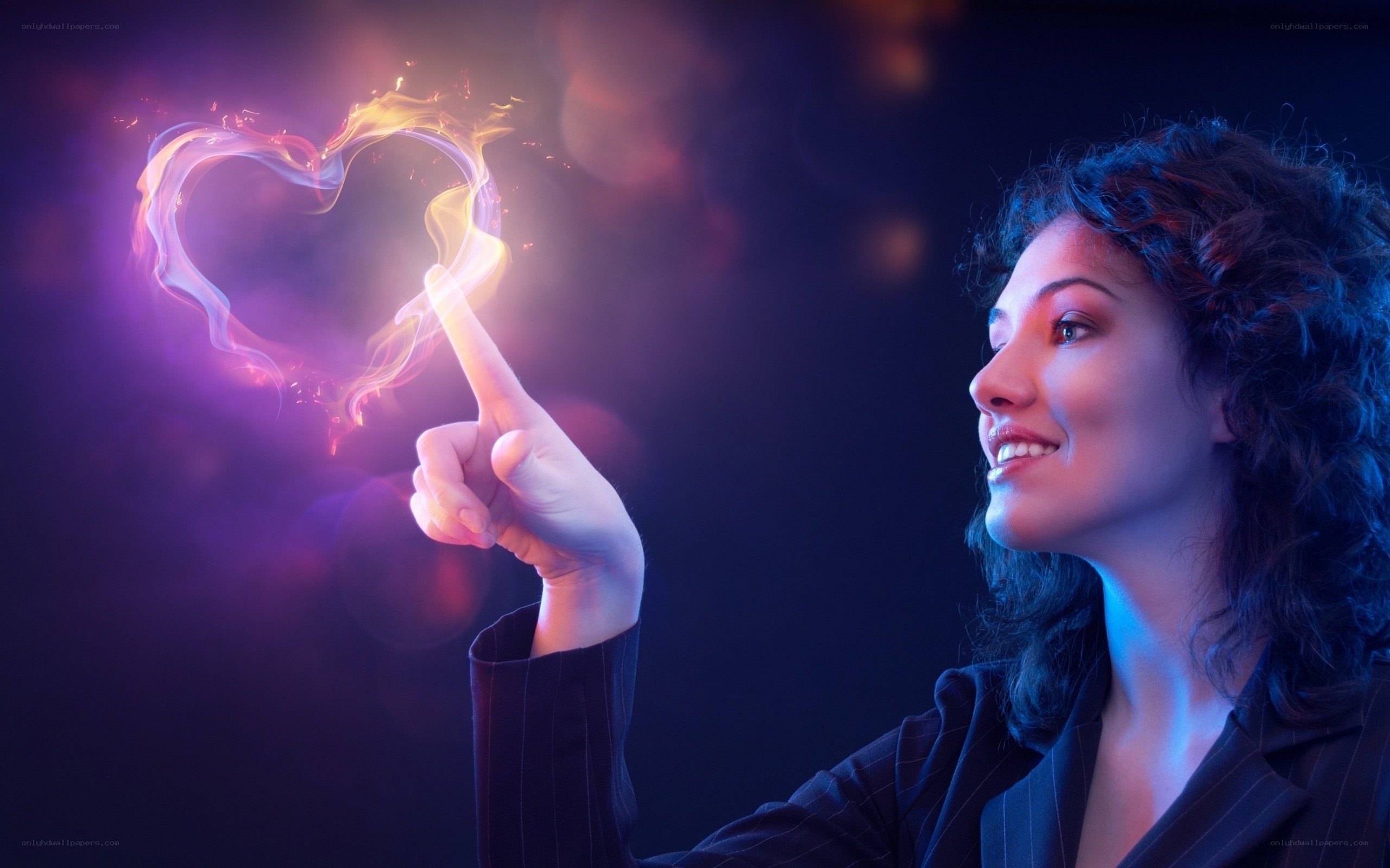 woman creating a fire heart