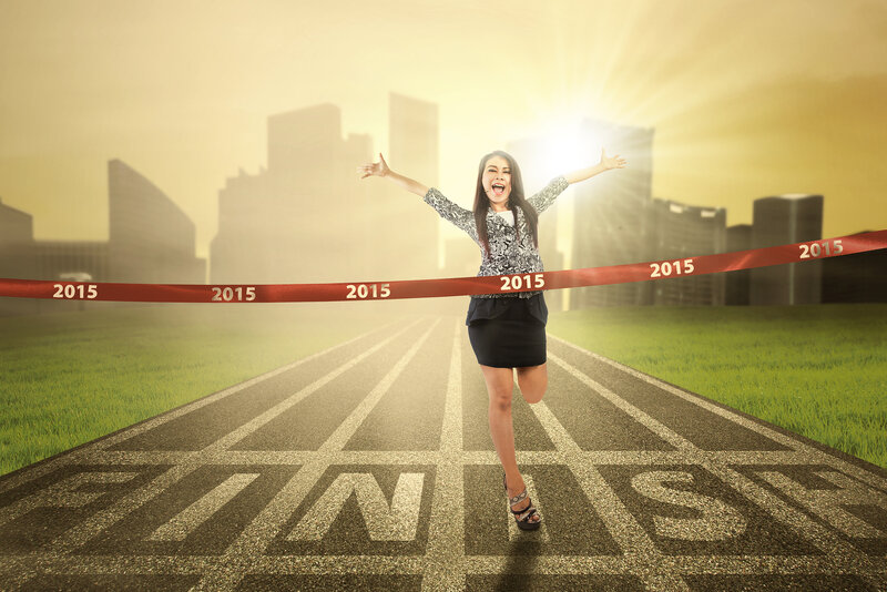 Woman Crossing Finish Line