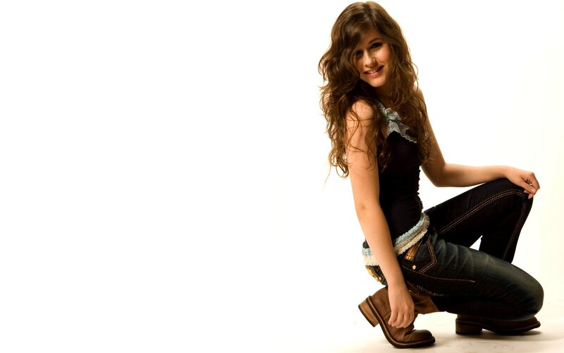 Woman Crouching in Jeans