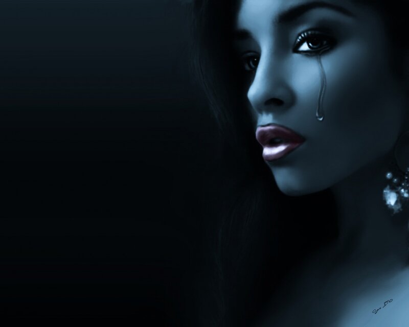 woman crying in dark