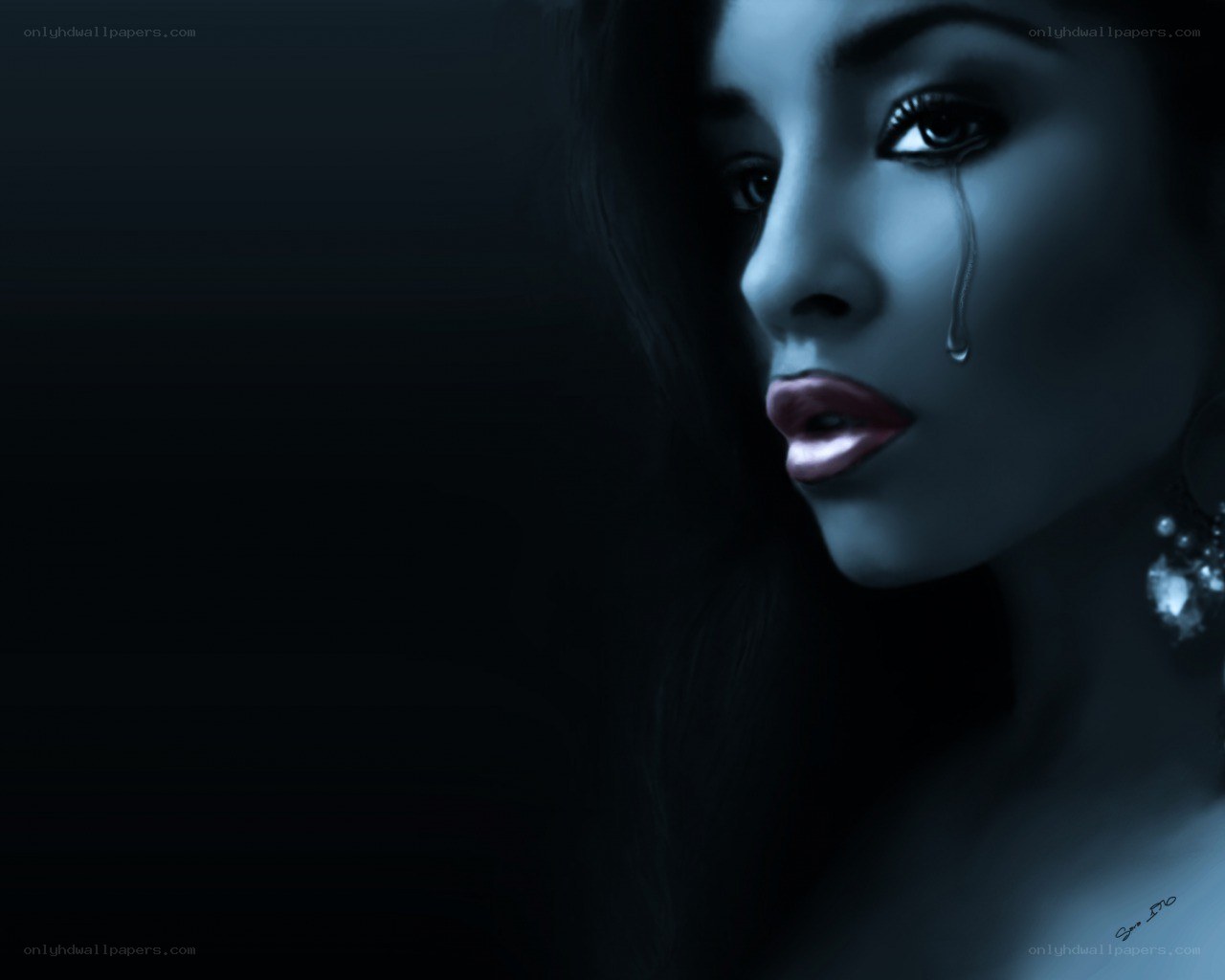 woman crying in dark