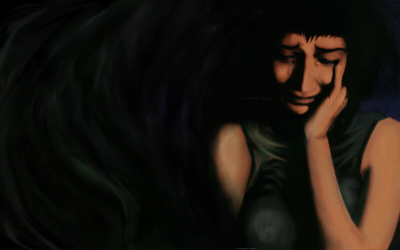 woman crying in darkness