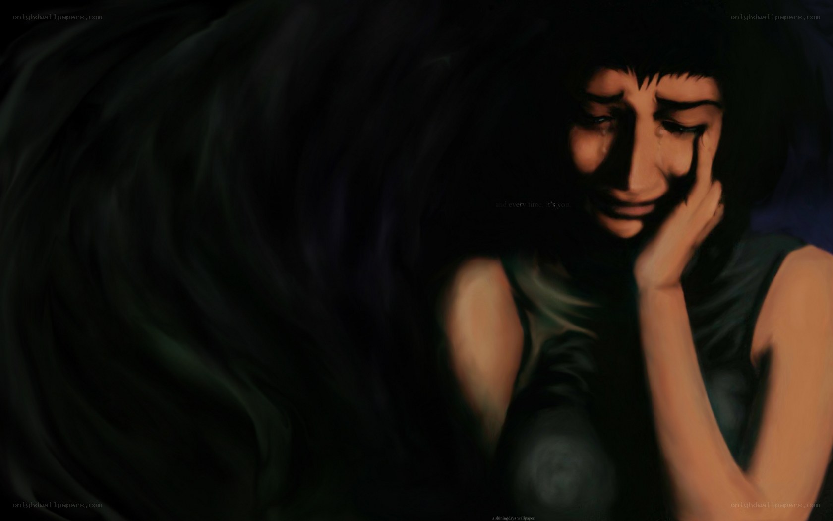 woman crying in darkness
