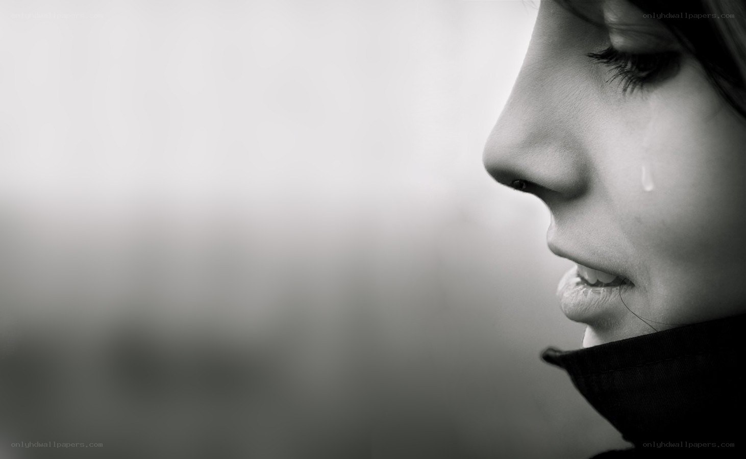 woman crying in profile
