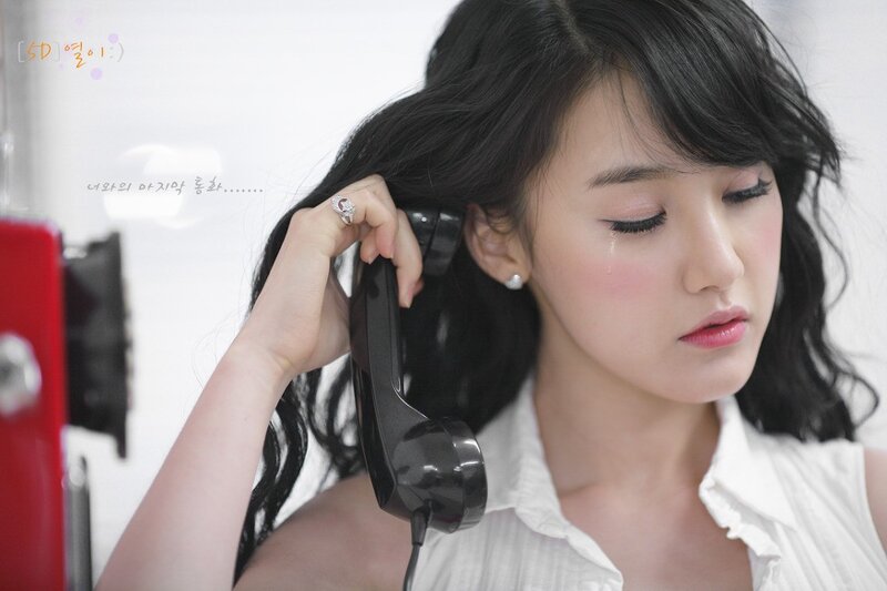 woman crying on phone