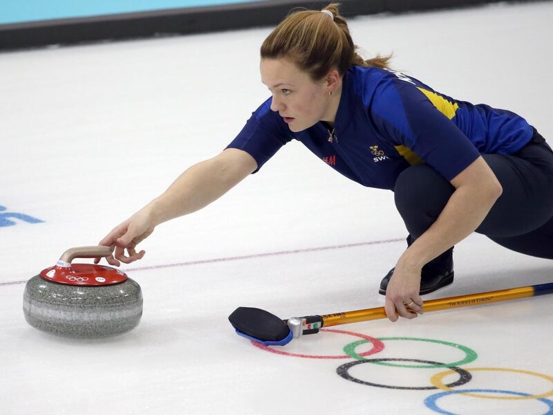 Woman Curling Stone