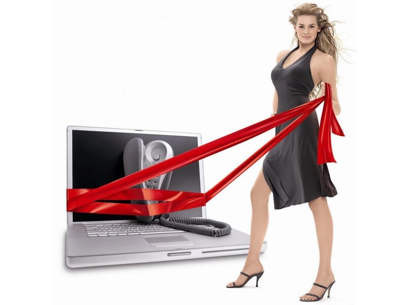 woman cutting ribbon with laptop