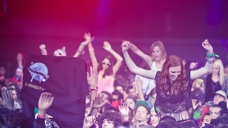 Woman Dancing at Concert