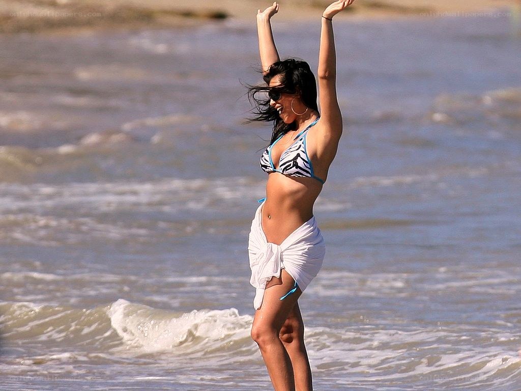 woman dancing at the beach