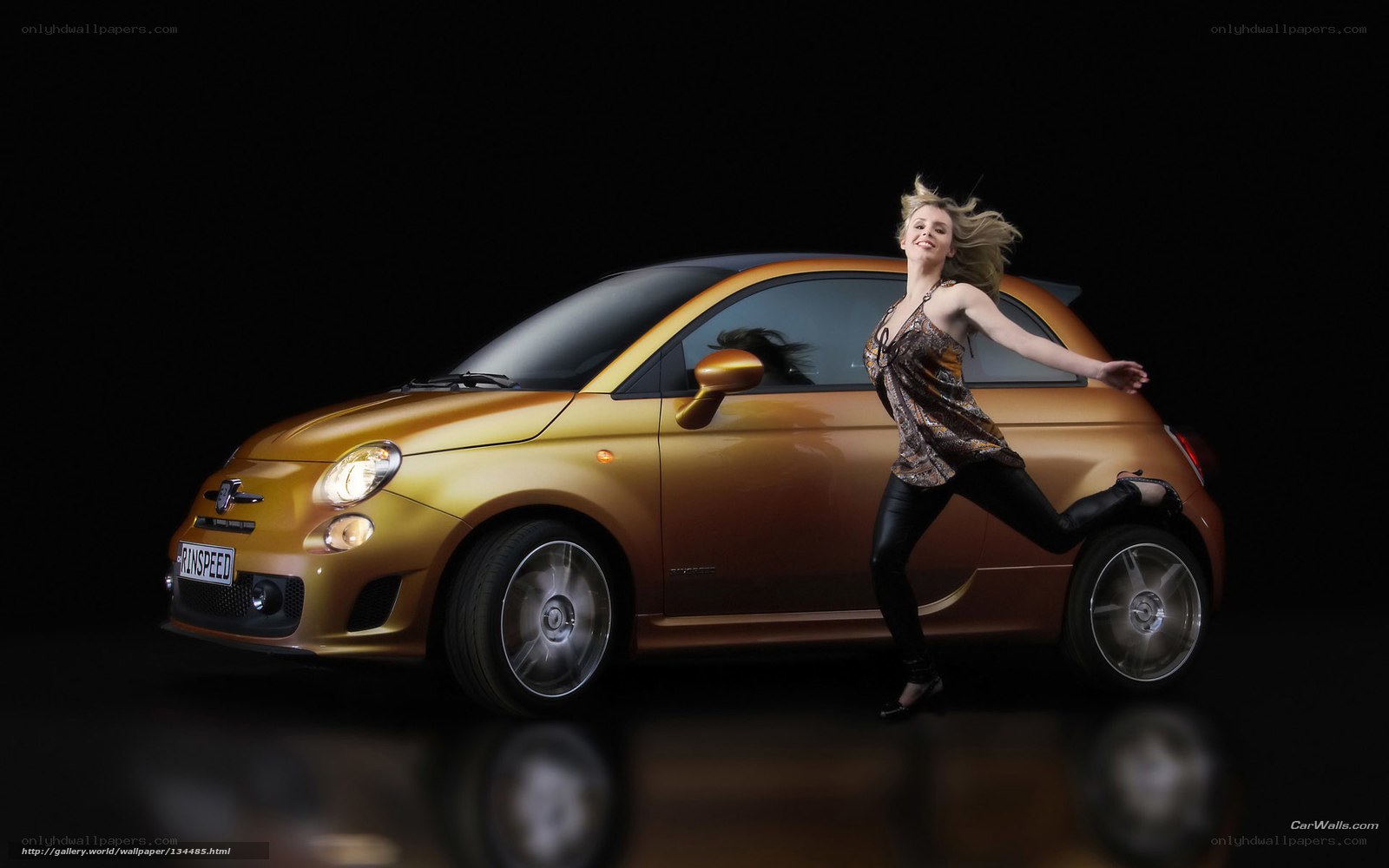 woman dancing beside a car
