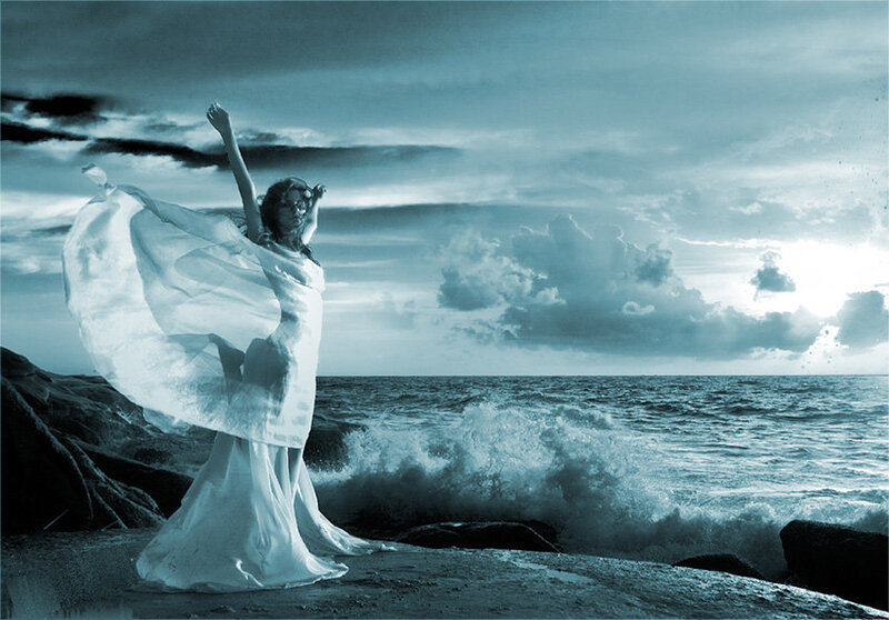 woman dancing by the sea