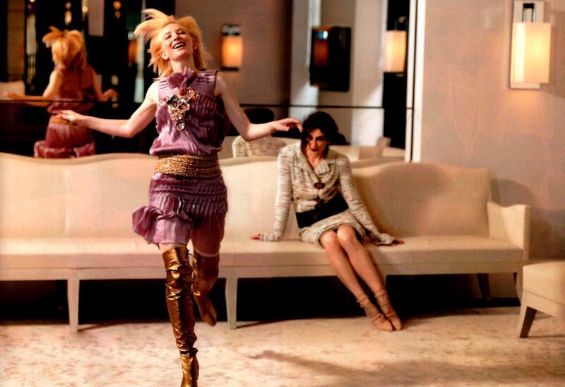 Woman dancing in a hotel lobby