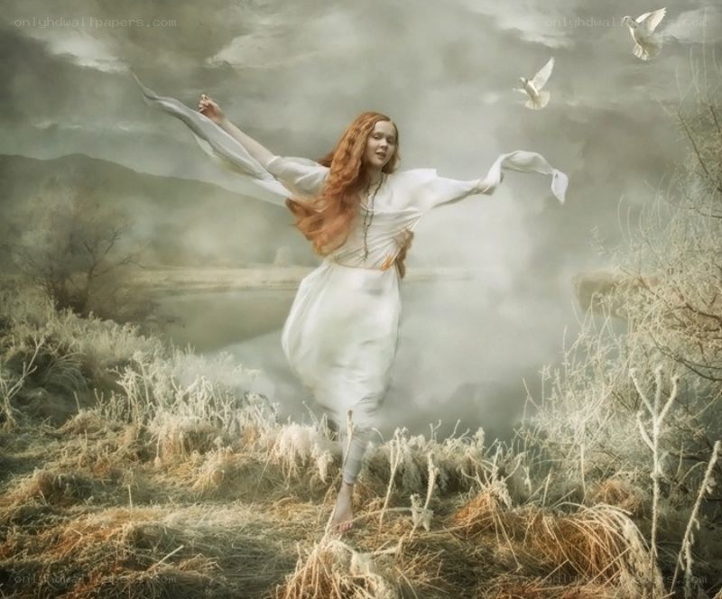 woman dancing in a misty field