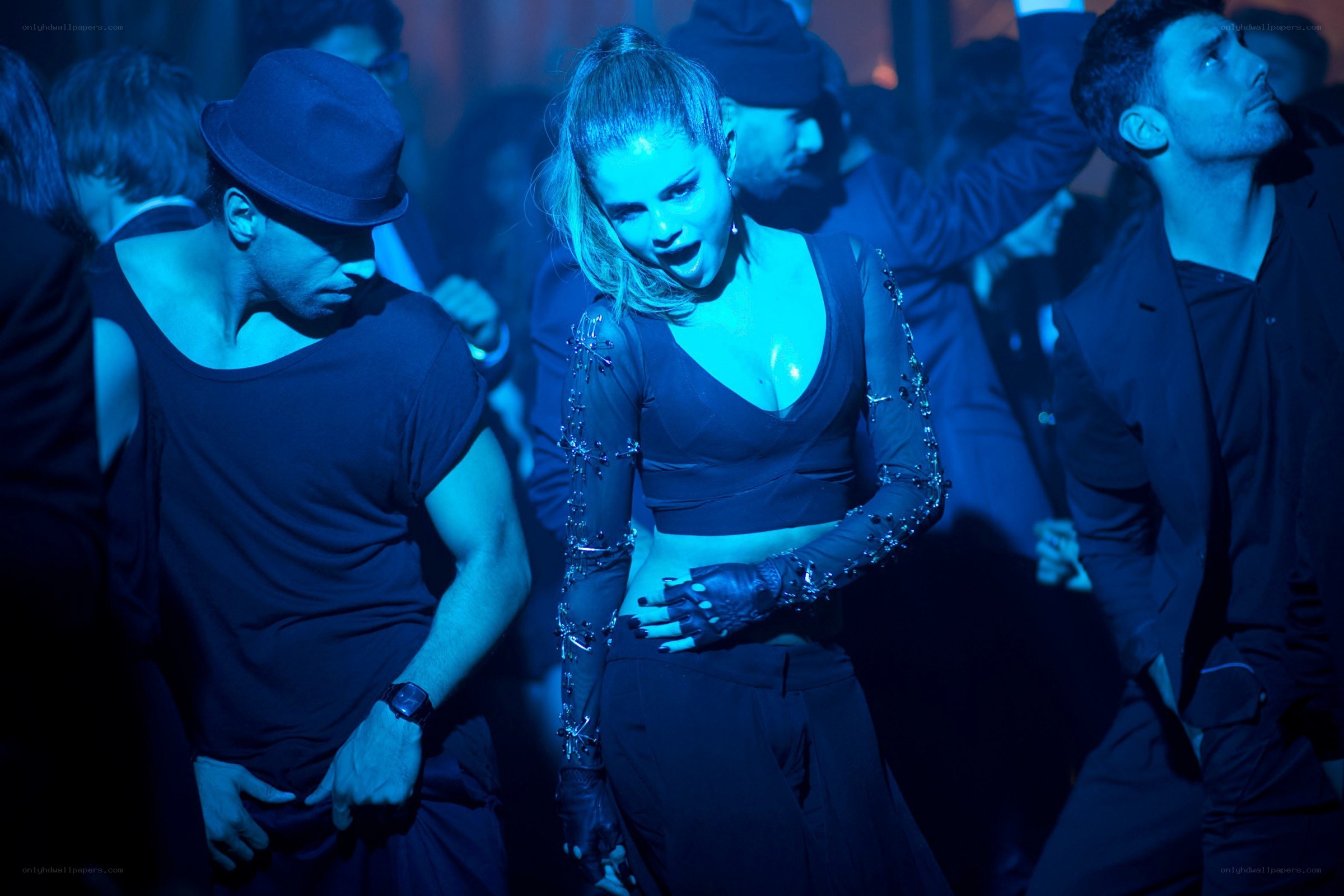 woman dancing in blue light