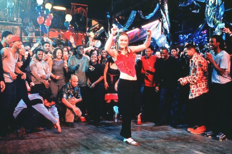 Woman Dancing in Crowd