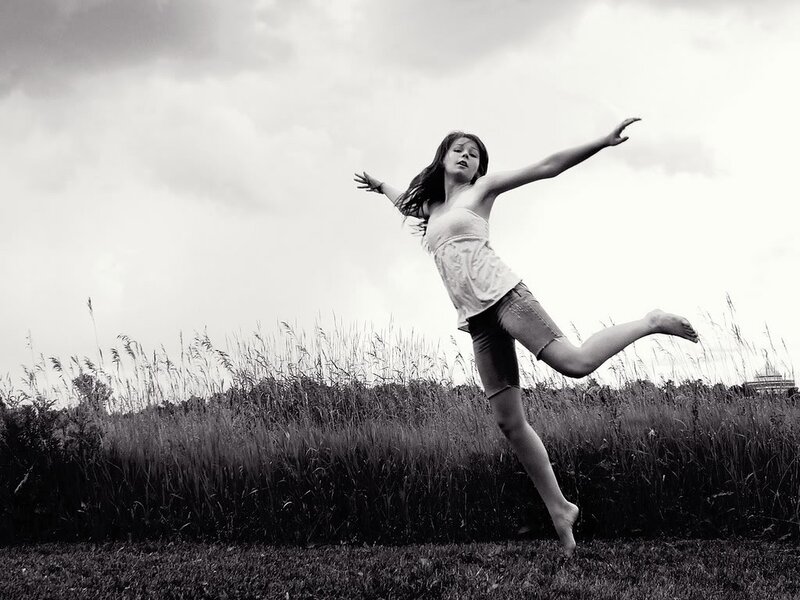 Woman Dancing in Field — Black