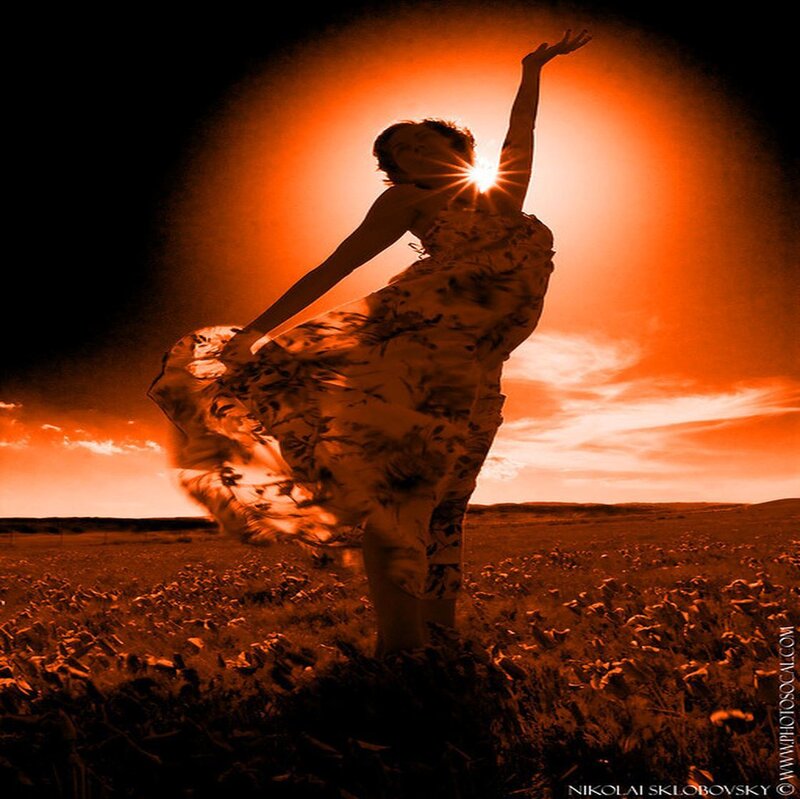 Woman Dancing in Field
