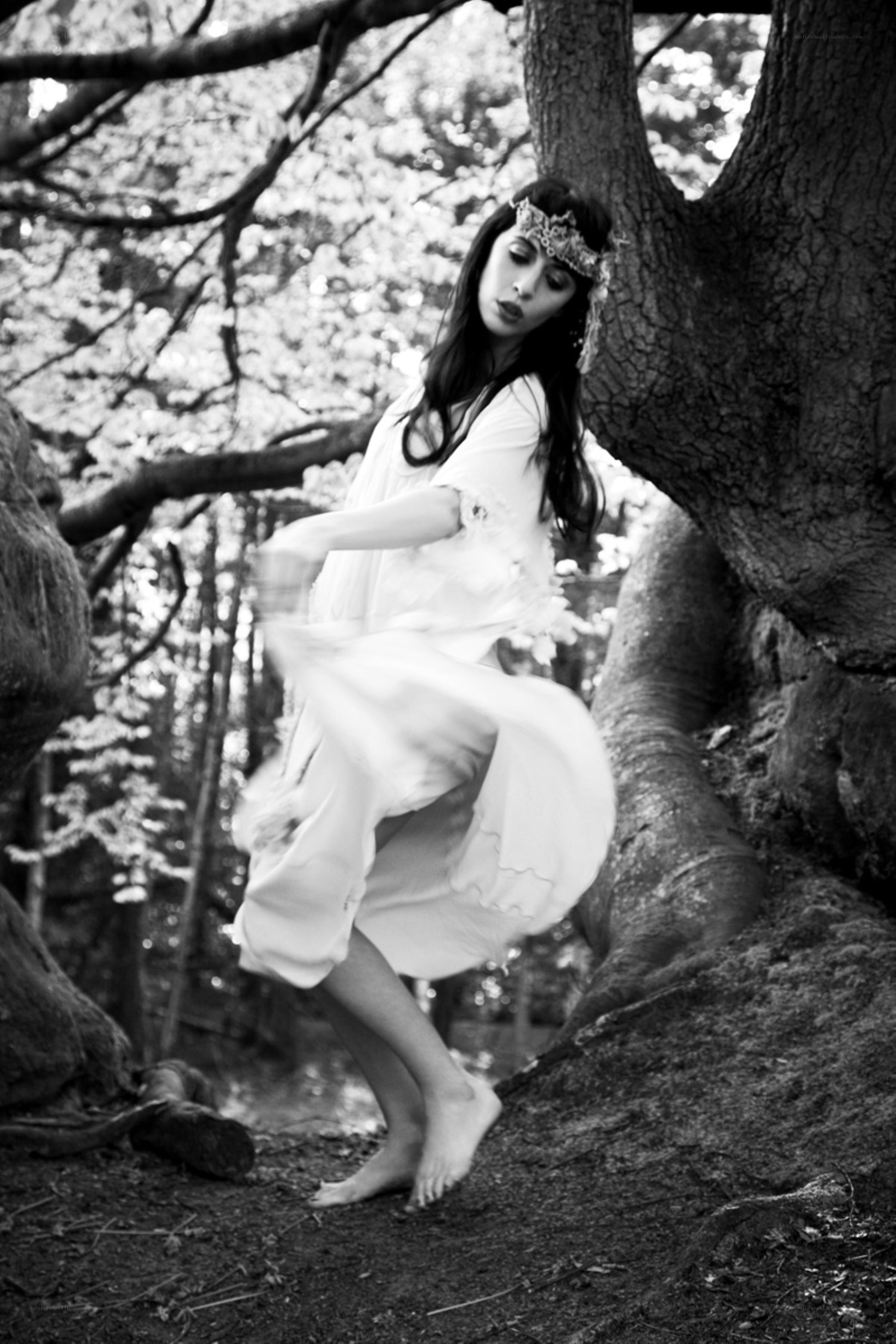 woman dancing in forest
