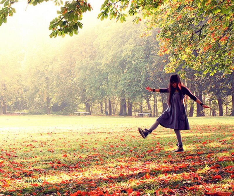 Woman Dancing in Park