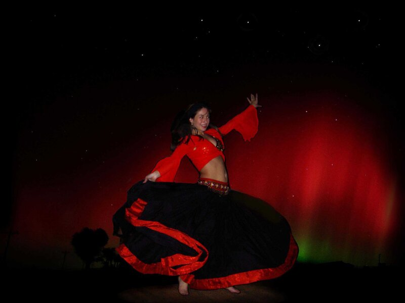 woman dancing in red and black