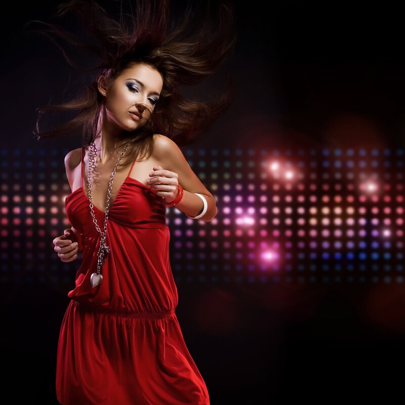 woman dancing in red dress