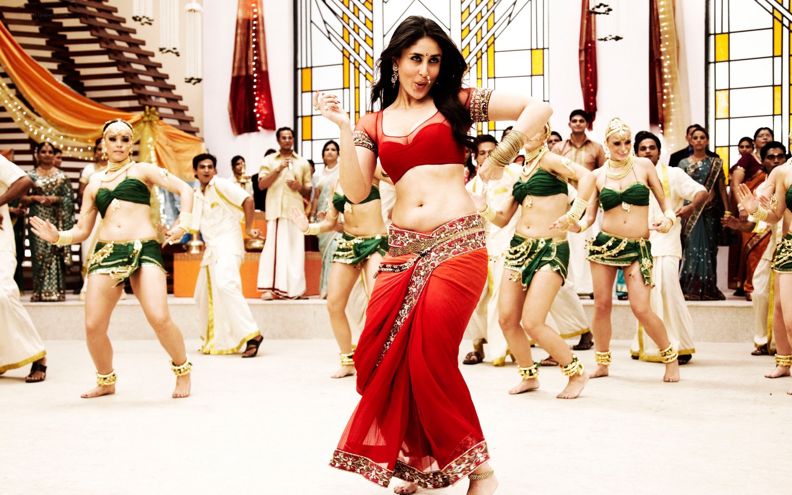 woman dancing in red sari