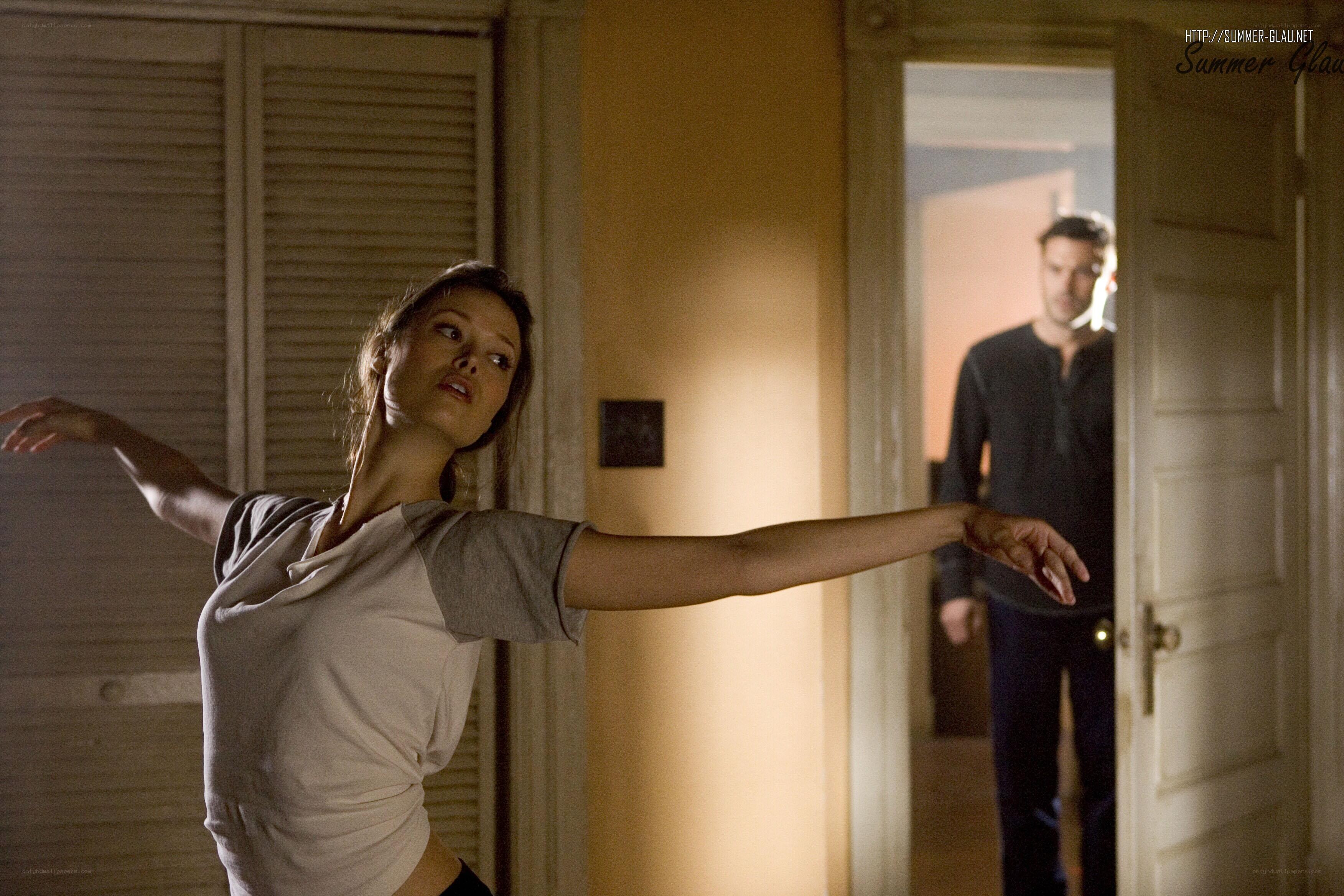 woman dancing in room