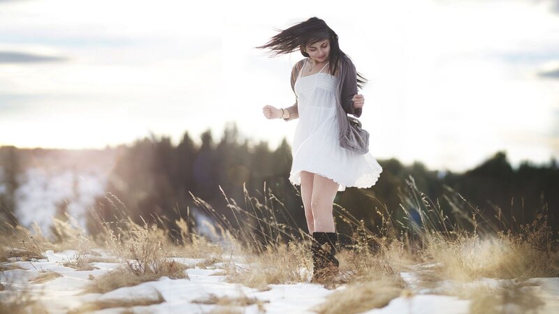 woman dancing in snowy field