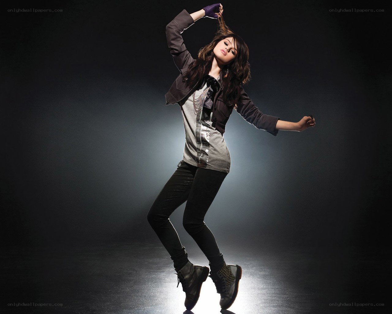 woman dancing in spotlight