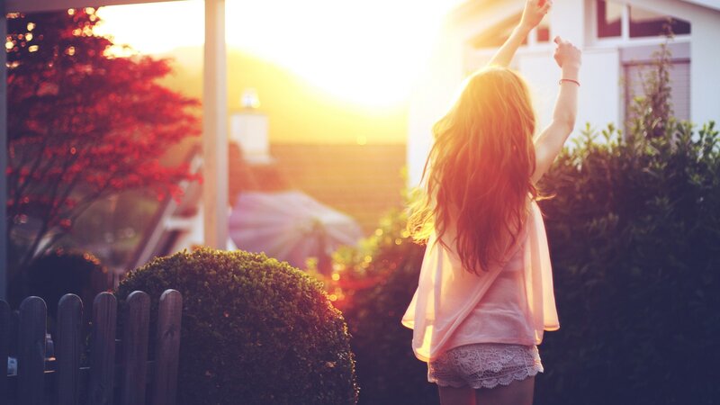 woman dancing in sunset