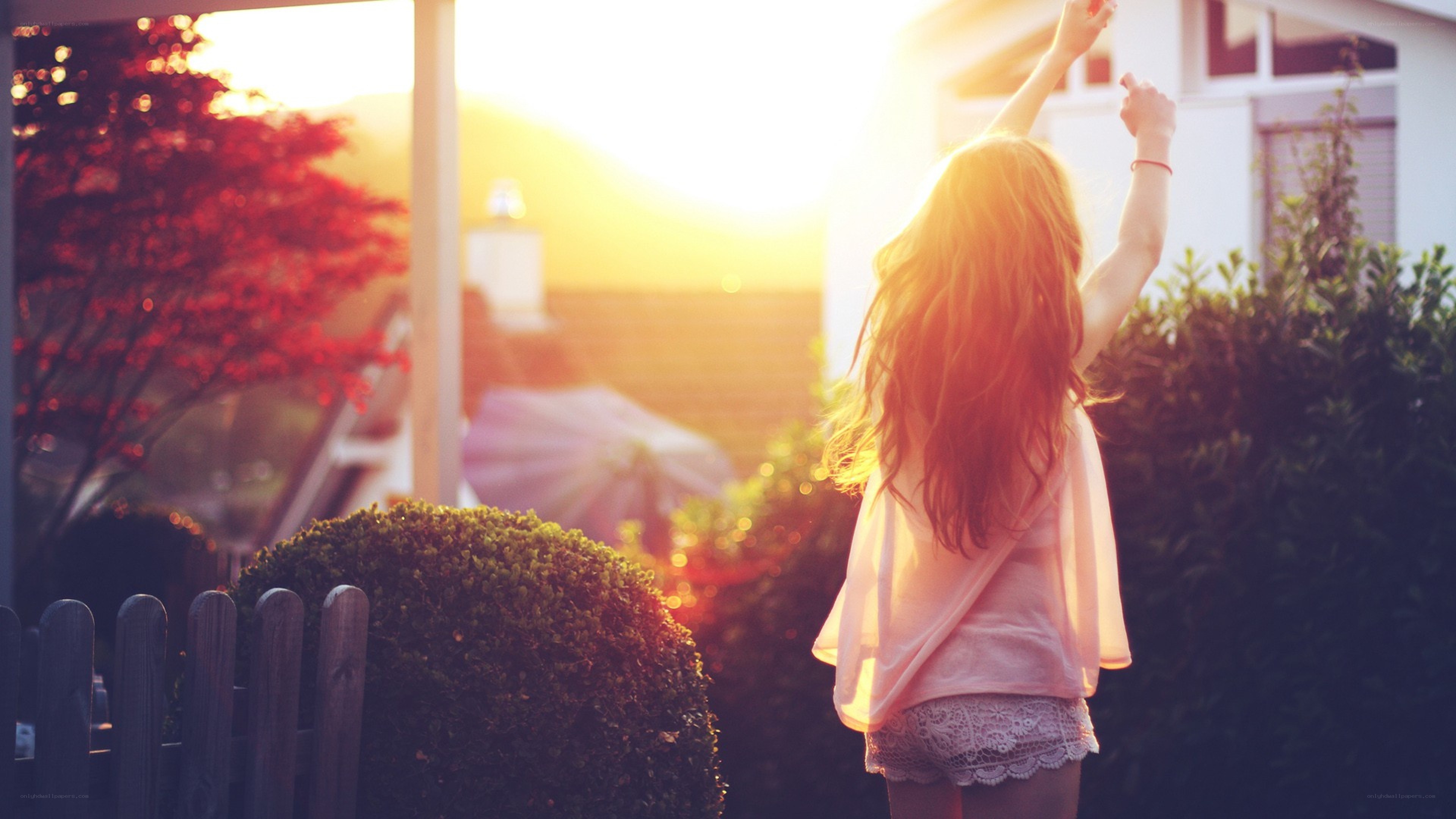 woman dancing in sunset