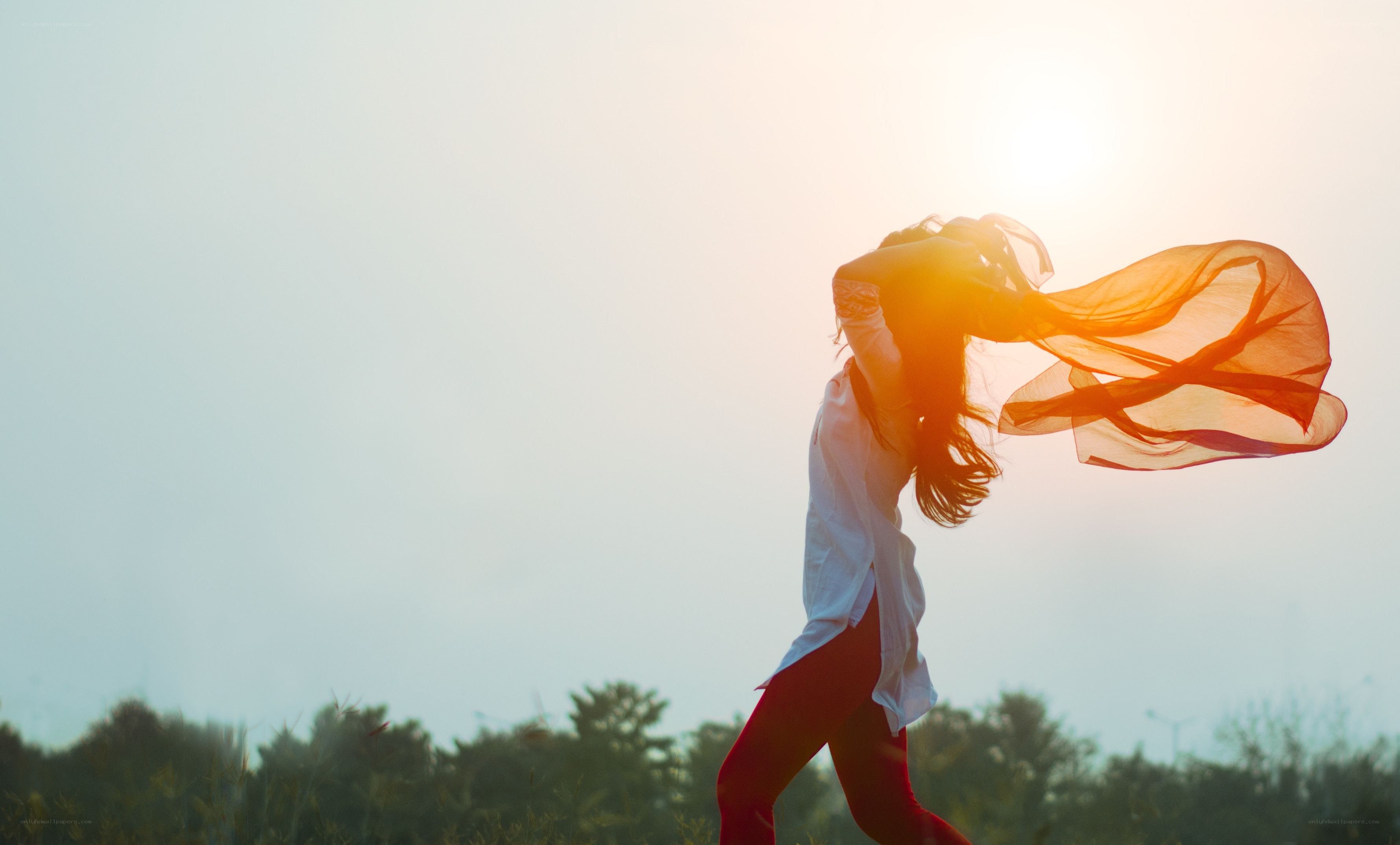 woman dancing in sunset