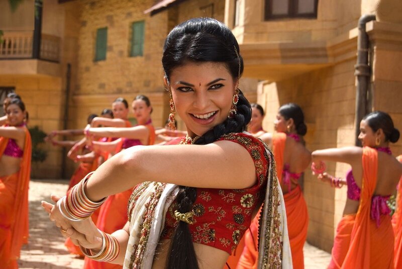 Woman dancing in traditional attire