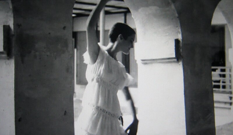 woman dancing in white dress