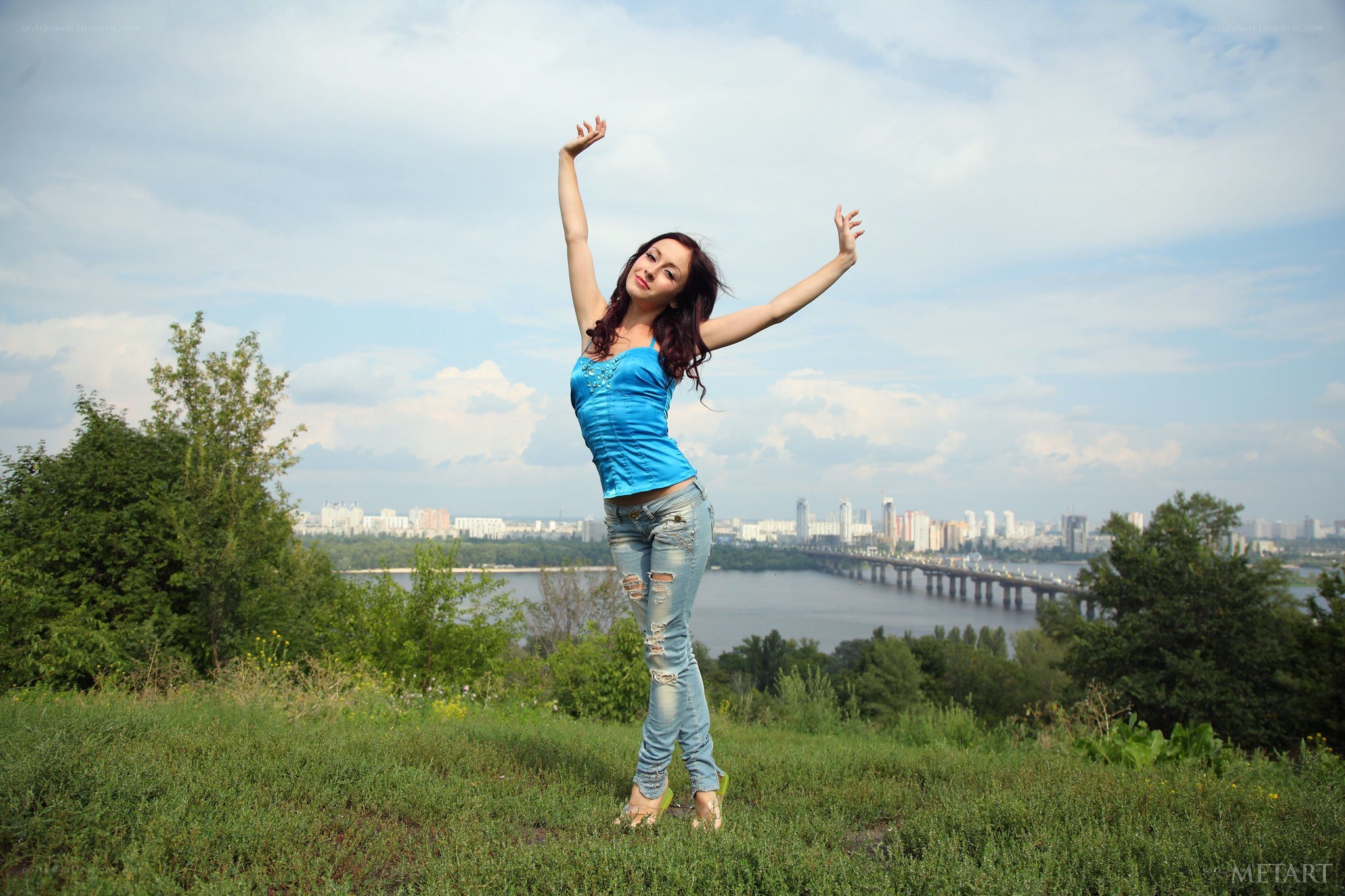 Woman dancing on a hill