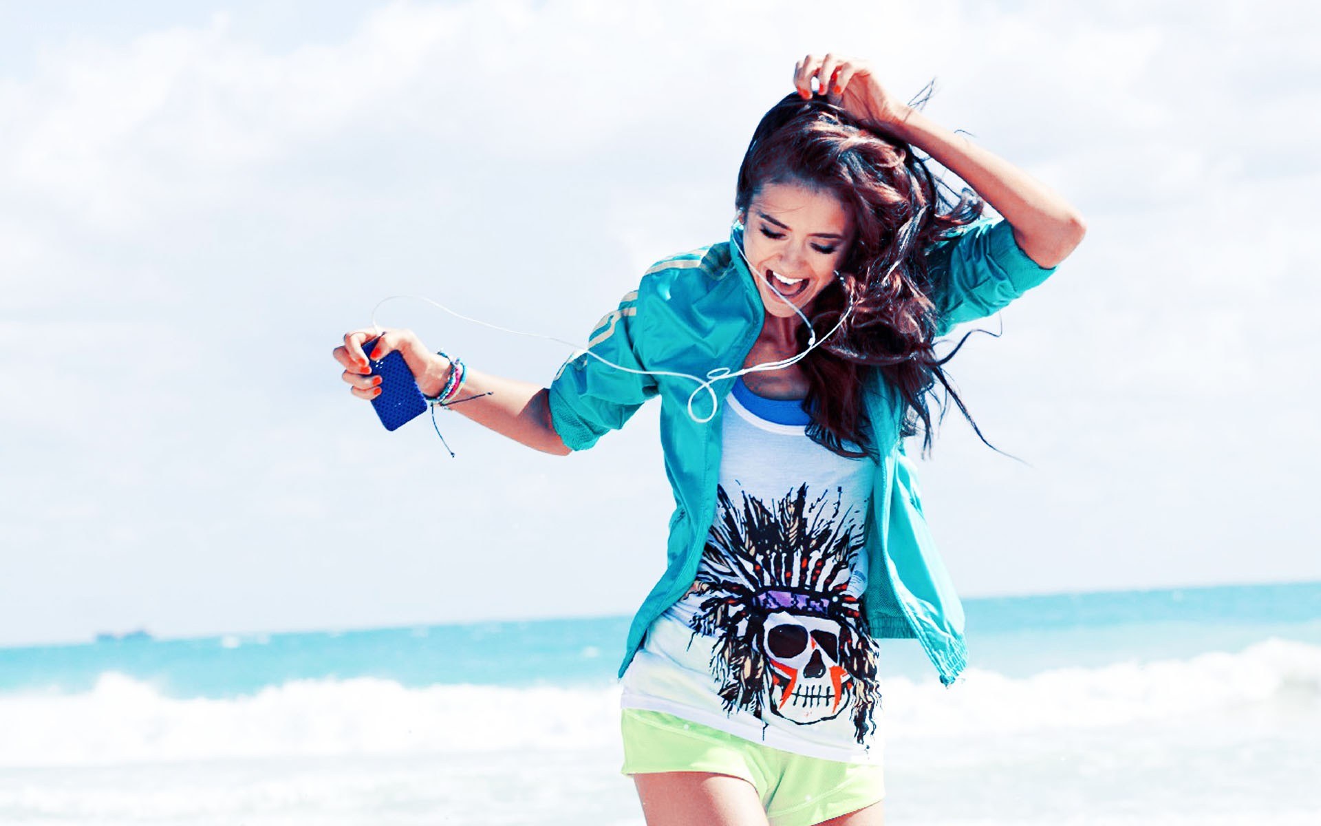 woman dancing on beach