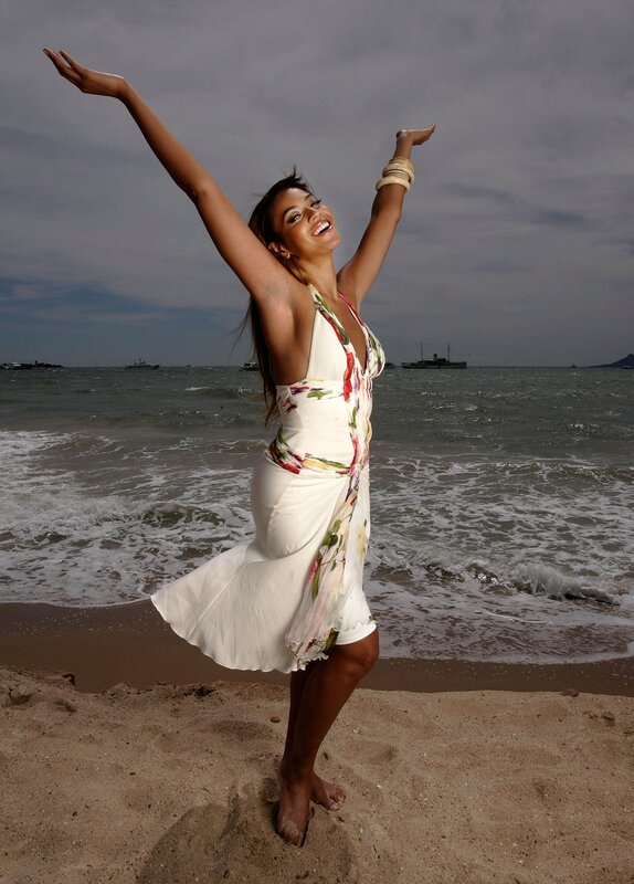 Woman dancing on beach