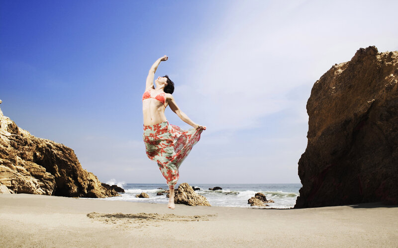 Woman Dancing on Beach — Blue, Serene, Afternoon