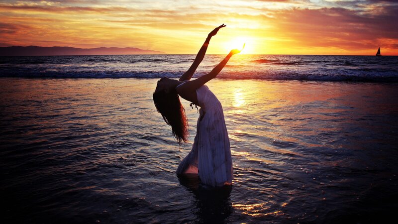 Woman Dancing on Beach — Orange, Serene, Sunset