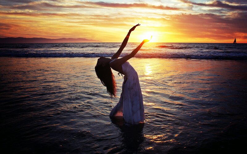 Woman Dancing on Beach — Orange, Serene